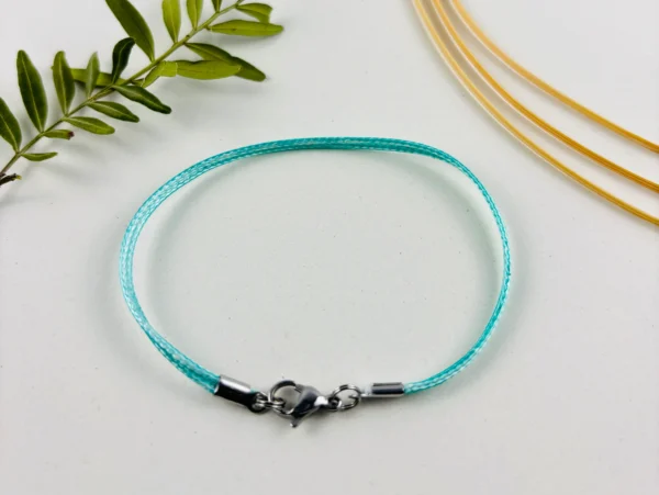 Upcycling Kitearmband Türkis